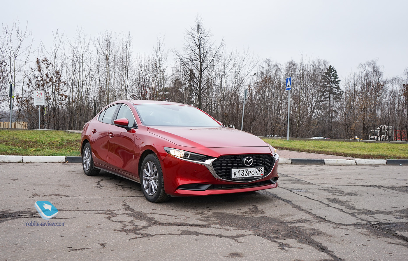  Mazda 3 .  -